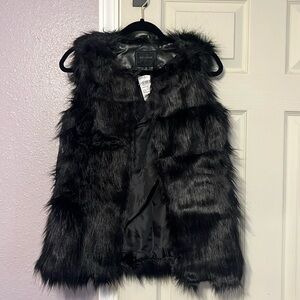 Black faux fur vest